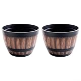 Pflanzgefäße, zwei rustikale Kunststoff-Pflanzgefäße im Weinfass-Stil mit...